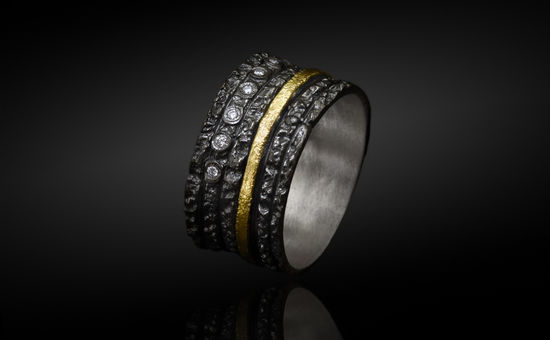 Ring aus Silber und 18K Gold mit Diamanten